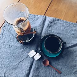 High angle view of coffee cup on table