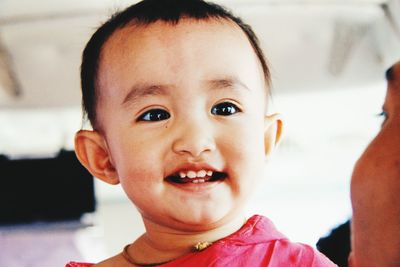 Close-up portrait of cute smiling