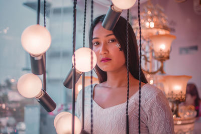 Portrait of young woman looking away