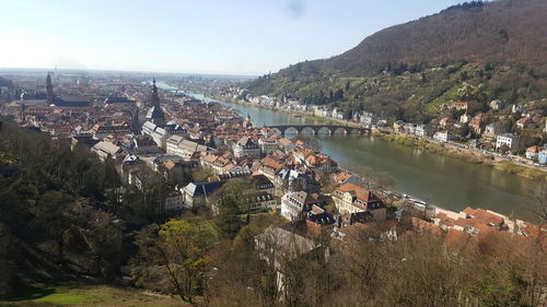 High angle view of river amidst buildings in town