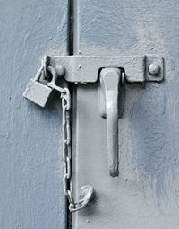 Close-up of key on door