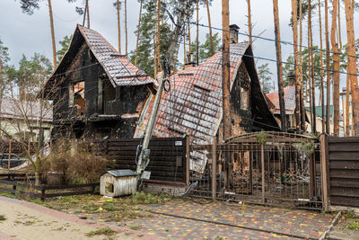 Destroyed buildings on the streets of irpen. broken windows. buildings after being hit by missiles.