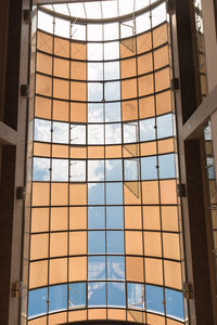 Low angle view of office building against sky