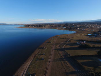 High angle view of city at riverbank