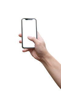 Midsection of person using mobile phone against white background