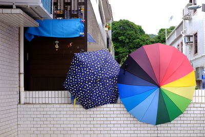 View of umbrellas hanging from building