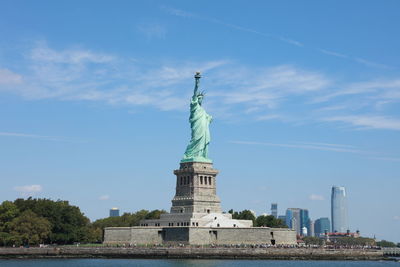 Statue of liberty against blue sky