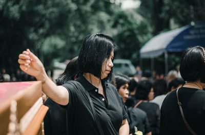 Rear view of woman against blurred background