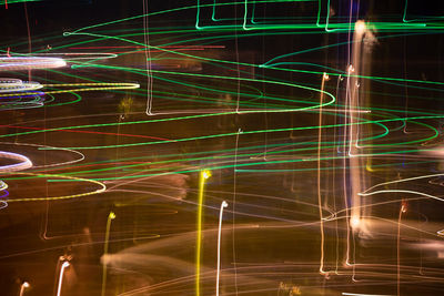 Digital composite image of light trails at night