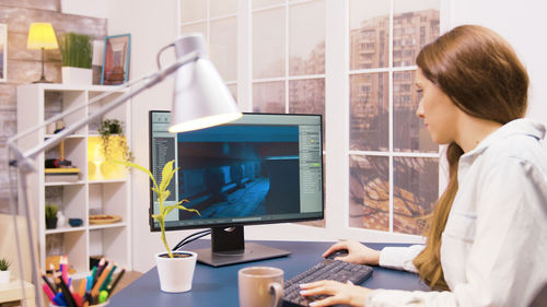 Businesswoman working on table