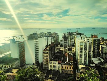 High angle view of buildings in city against sky