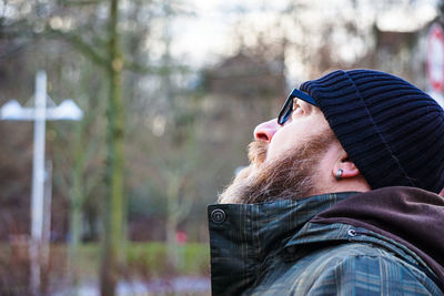 Portrait of young man wearing hat outdoors