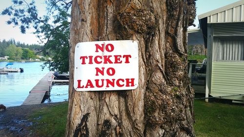 Information sign on tree trunk