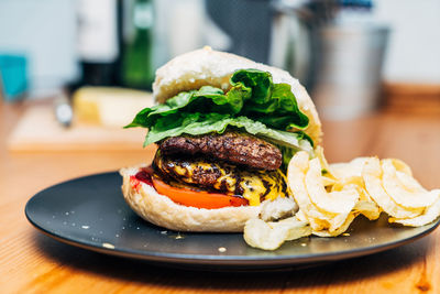 Close-up of burger in plate on table