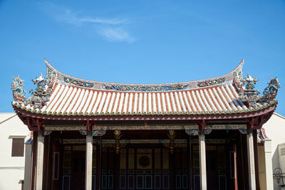 Low angle view of temple building against sky