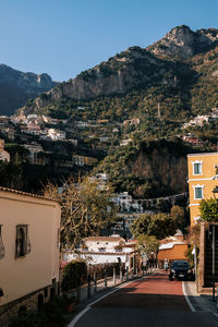 High angle view of townscape against mountain