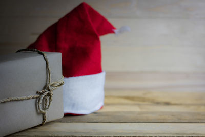 Close-up of red tied up on table