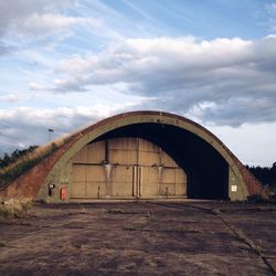 Built structure against cloudy sky