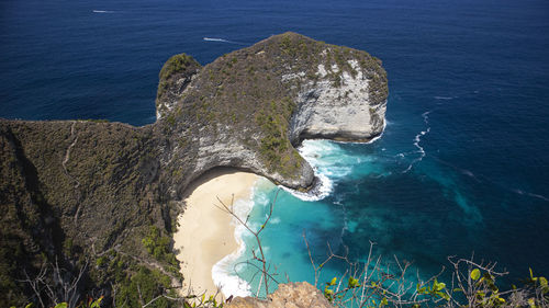 High angle view of rock formation in sea