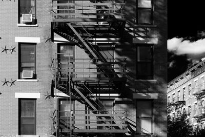 Low angle view of staircase in building black and white