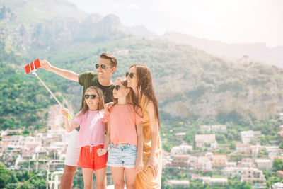 High angle view of people standing on mountain