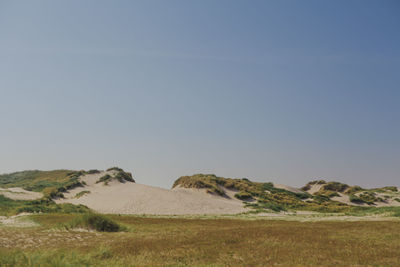 Scenic view of landscape against clear sky