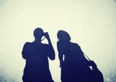 Shadow of man on wall