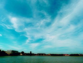 View of river against cloudy sky