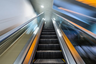 Blurred motion of escalator at subway station