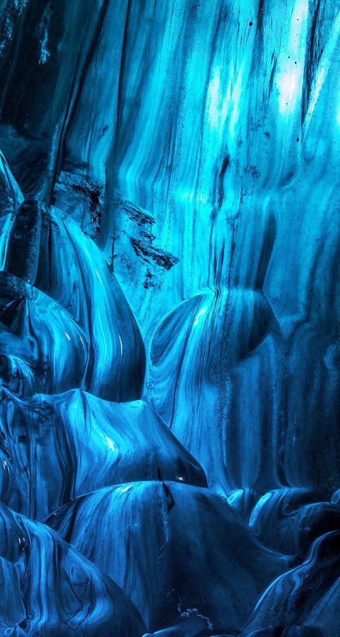 blue, full frame, indoors, textured, backgrounds, cave, rock - object, famous place, rock formation, pattern, travel, travel destinations, day, tourism, no people, low angle view, geology, sunlight, nature