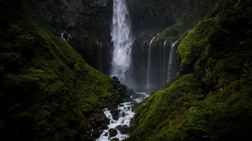 Scenic view of waterfall in forest