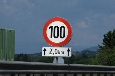 100 kilometers per hour speed limit traffic sign on the road