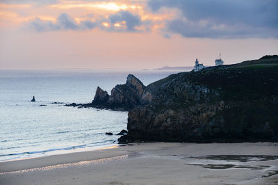 Scenic view of sea against sky during sunset