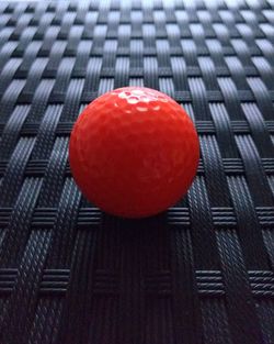 High angle view of red ball on table