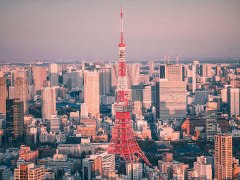 Cityscape against sky during sunset