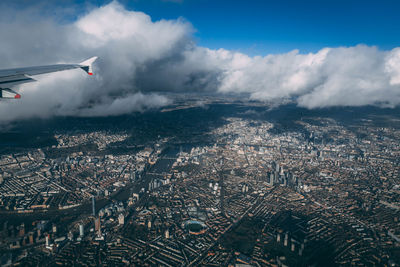 Aerial view of cityscape against sky