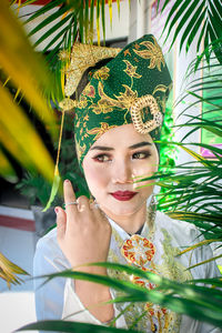 Smiling woman wearing headdress