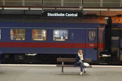 Full length of train on railroad station platform