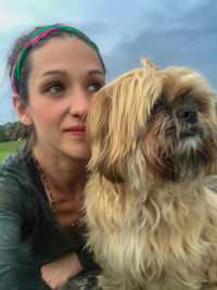 Portrait of woman with dog