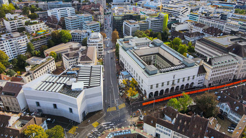 High angle view of street amidst buildings in city