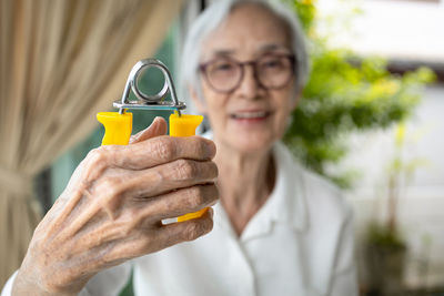 Portrait of senior woman exercising