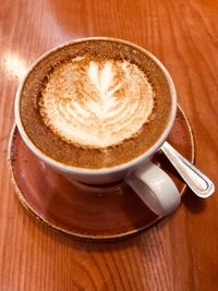 Close-up of cappuccino on table