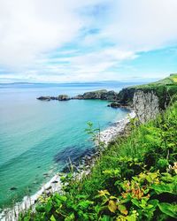 Scenic view of bay against sky