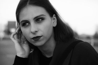 Close-up portrait of young woman