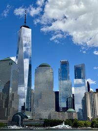 Modern buildings in city against sky