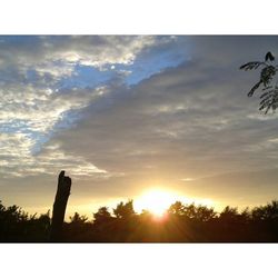 Sun shining through clouds