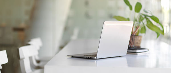 Close-up of laptop on table