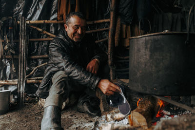 Portrait of man preparing food