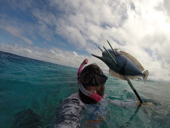 View of boat in sea against sky
