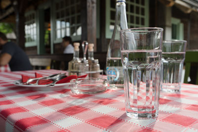 Glass of wine glasses on table at restaurant